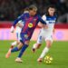 FC Barcelona and Deportivo Alavés players battling for possession in a LaLiga match